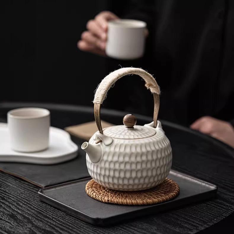 Minimalism White Ceramic Teapot with Iron Handle,Build-in Filter,Honey Cone Surface - TPotsOriental