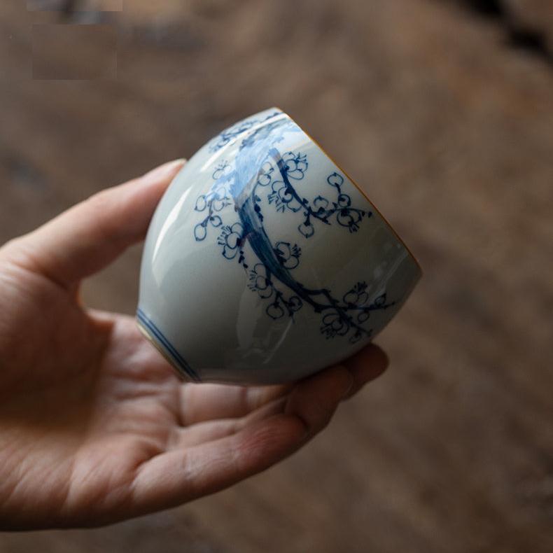 Tazza da tè cinese classica a forma di uovo con smalto blu cobalto in fiore orientale